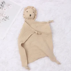 Doudou lion en mousseline et coton