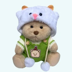 Nino – L’ours en peluche articulé fait main avec combinaison tricoté verte