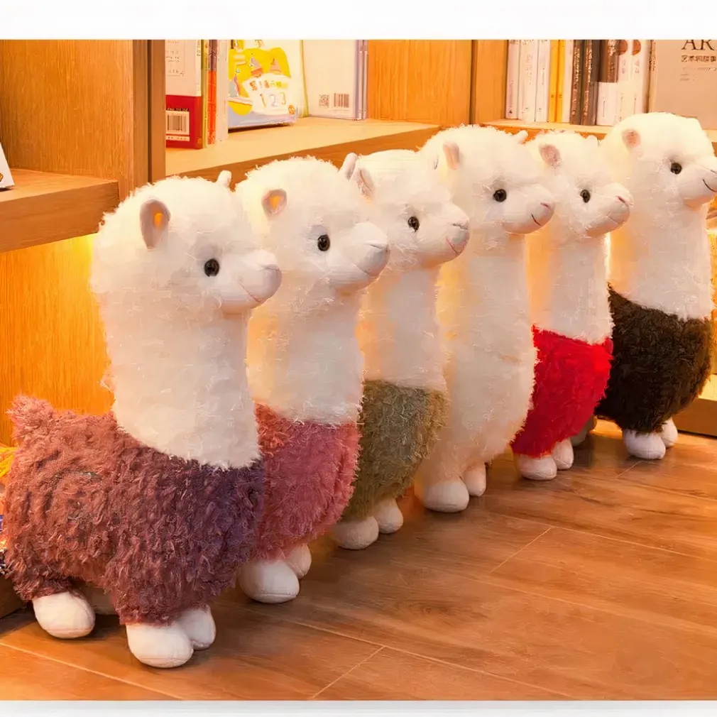 Peluche alpaga à robe colorée
