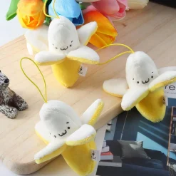 Peluche banane jaune épluchée