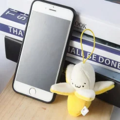 Peluche banane jaune épluchée