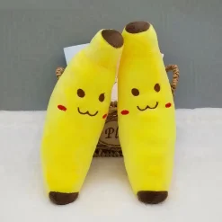 Peluche banane souriante