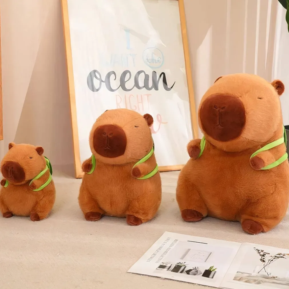 Peluche capybara avec sac à dos tortue
