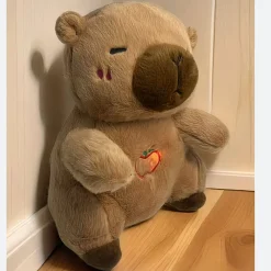 Peluche capybara qui respire avec berceuses intégrées