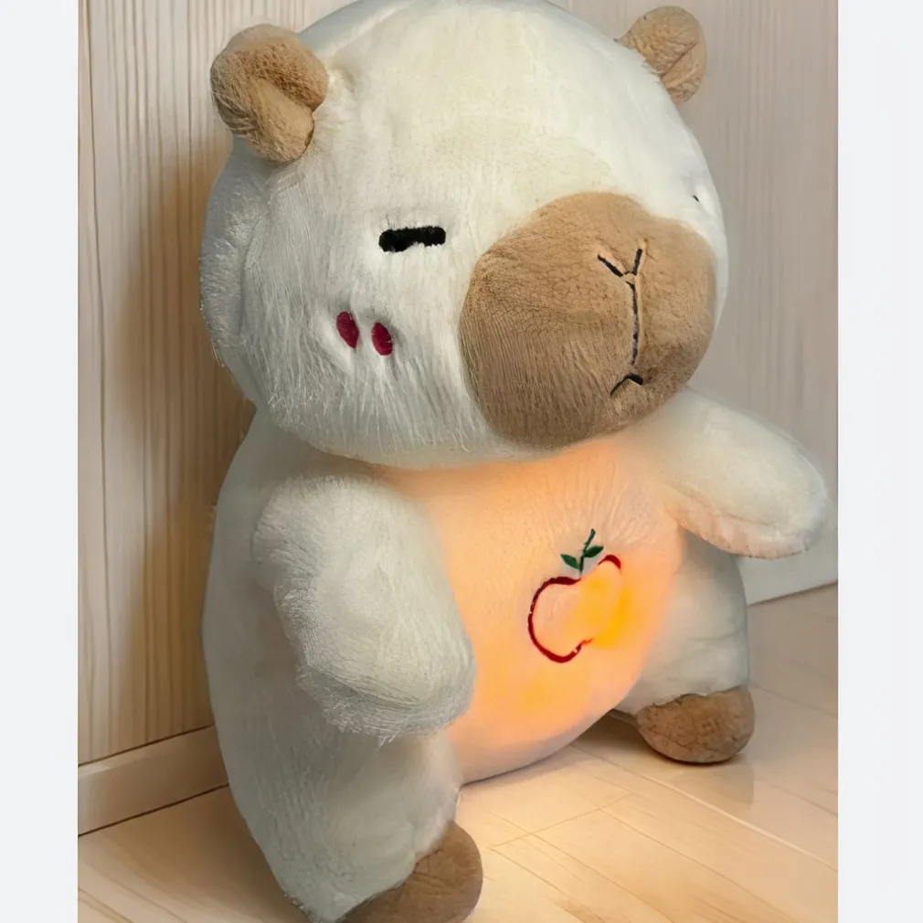 Peluche capybara qui respire avec berceuses intégrées