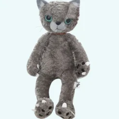 Peluche chat beige mécontent assis