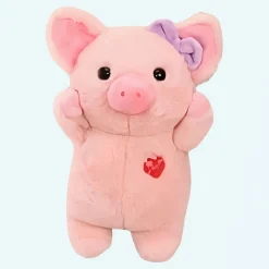 Peluche cochon avec nœud violet