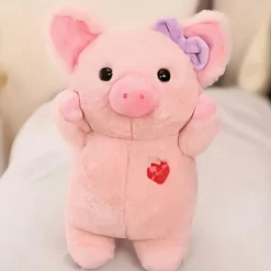 Peluche cochon avec nœud violet