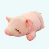 Peluche cochon avec petit nœud rose