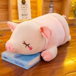 Peluche cochon avec petit nœud rose