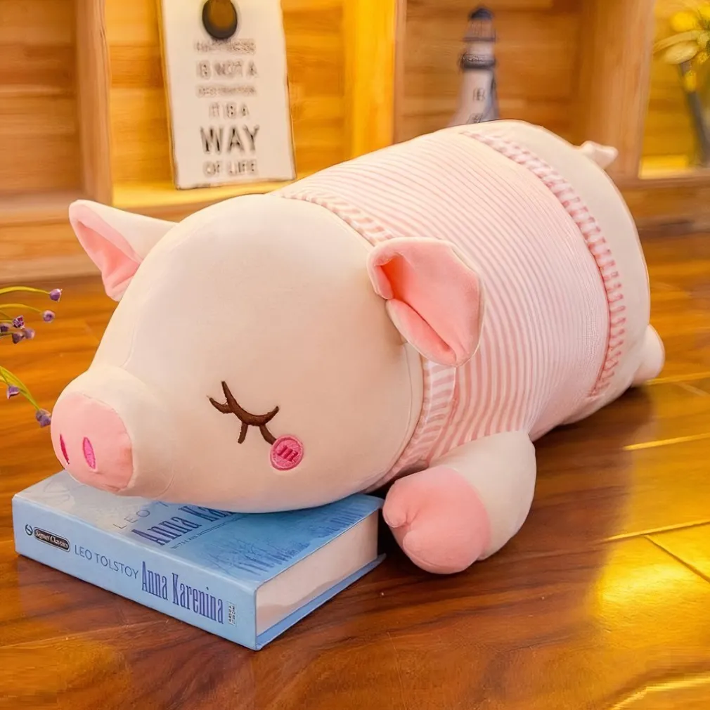 Peluche cochon avec petit nœud rose