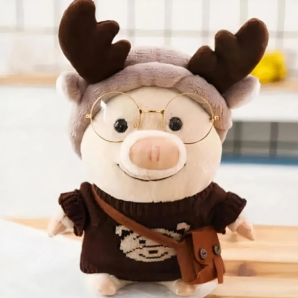Peluche cochon habillé en renne