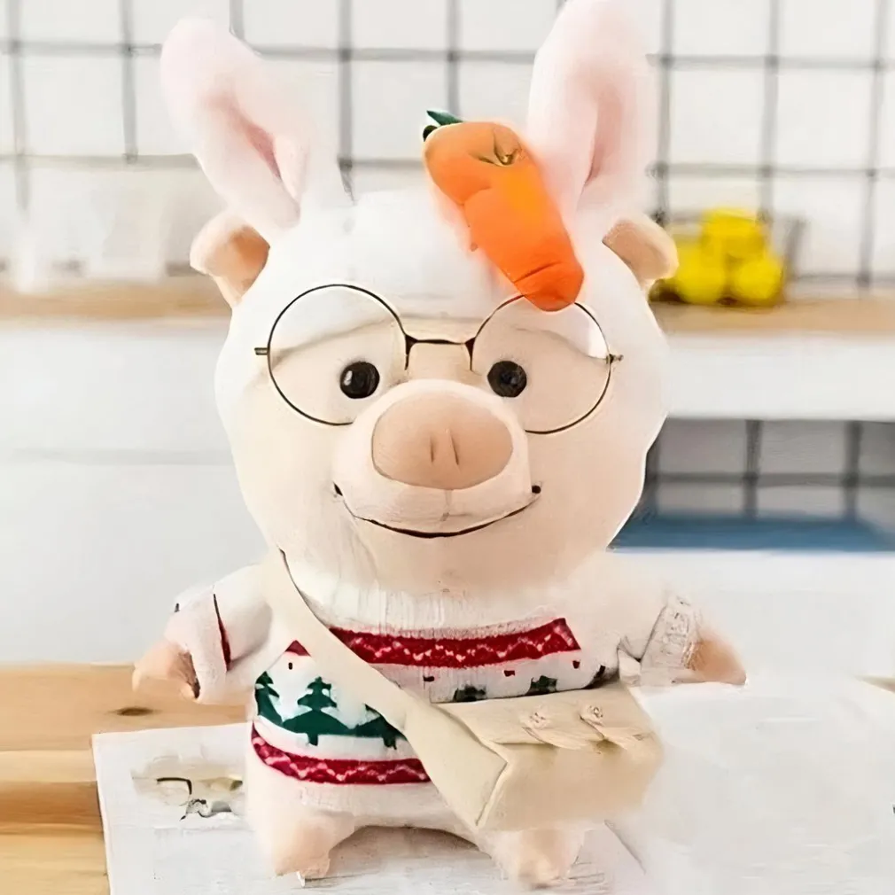 Peluche cochon habillé pull Noël