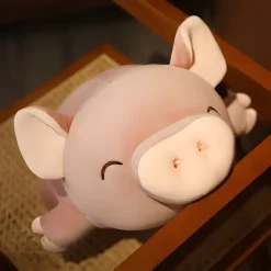 Peluche cochon joyeux