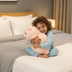 Peluche cochon rose joyeux