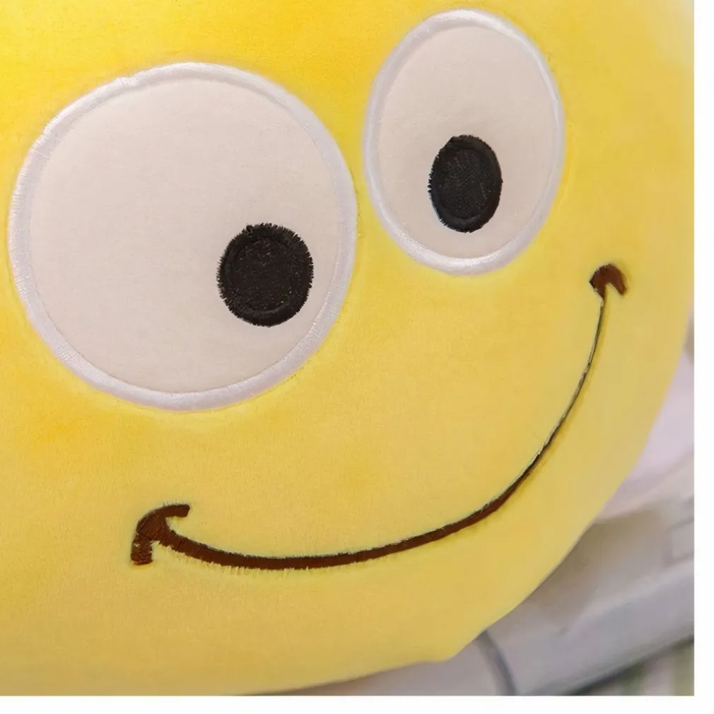 Peluche coussin abeille souriante