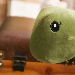 Peluche dinosaure vert