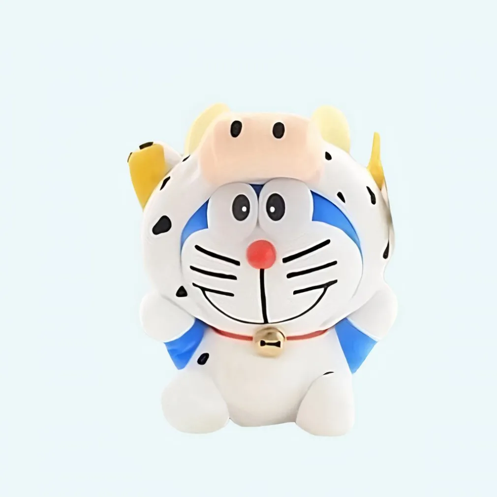 Peluche Doraemon déguisé en vache