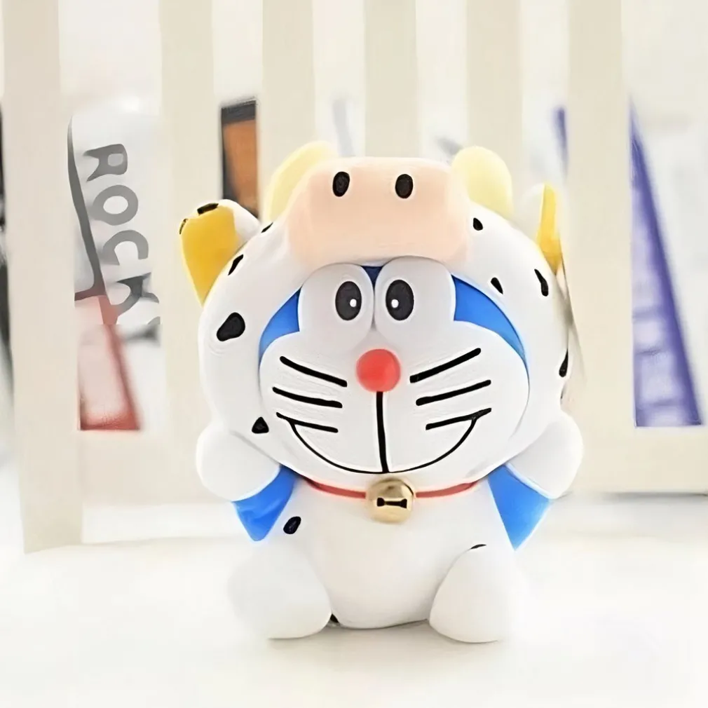 Peluche Doraemon déguisé en vache