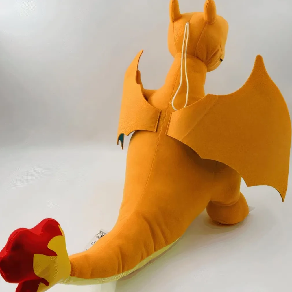 Peluche Dracaufeu Assis