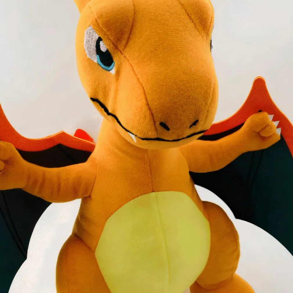 Peluche Dracaufeu Assis