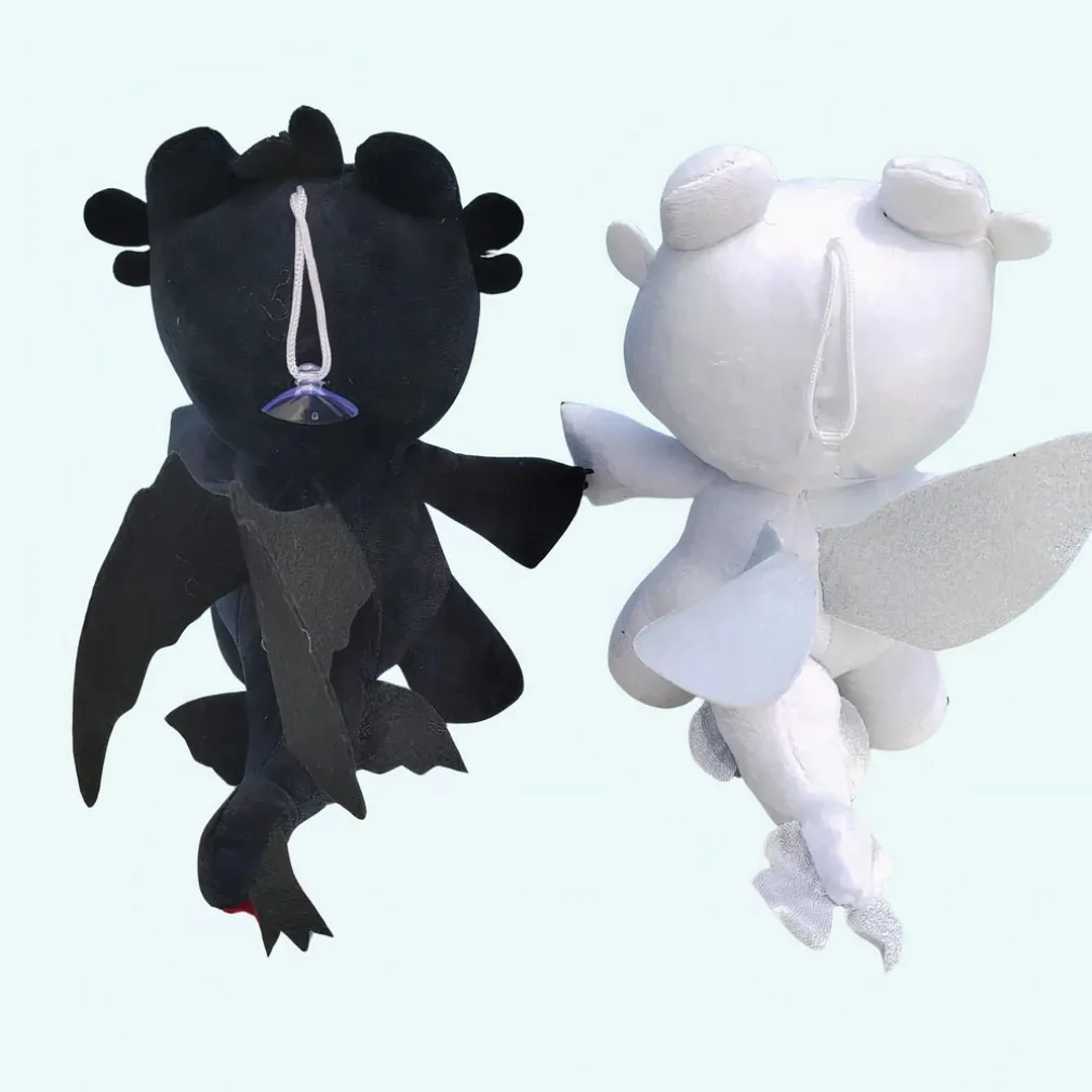 Peluche dragon noir ou blanc