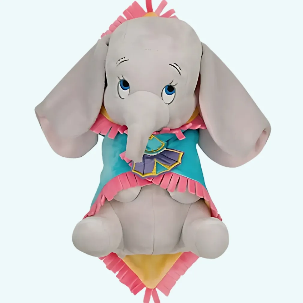 Peluche Dumbo dans sa couverture