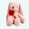 Peluche géante lapin avec une rose