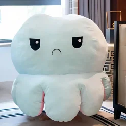 Peluche géante pieuvre réversible visage content et pas content