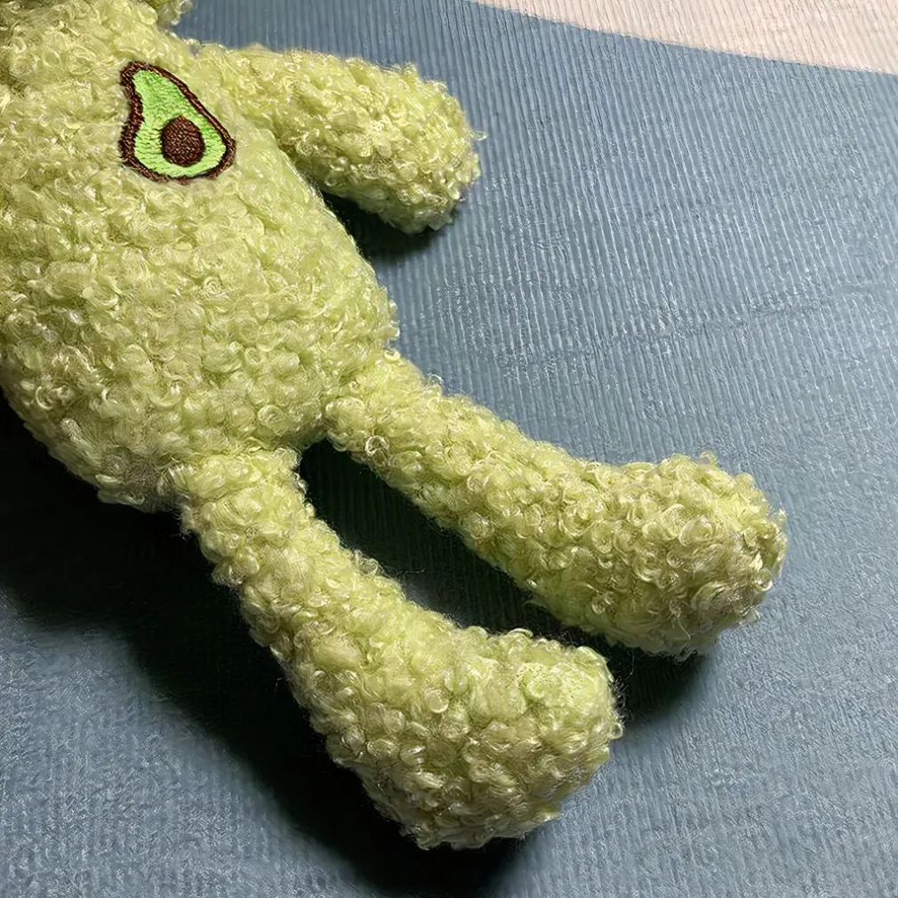 Peluche grenouille avec avocat