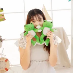 Peluche grenouille photographe