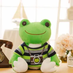 Peluche grenouille photographe
