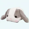 Peluche lapin gris couché