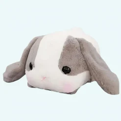 Peluche lapin gris couché