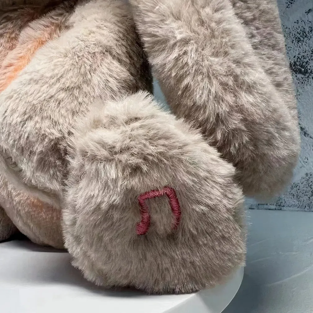 Peluche lapin qui respire avec berceuse apaisante
