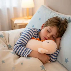 Peluche lestée dinosaure rose
