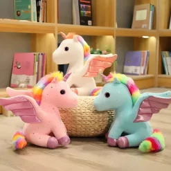 Peluche licorne avec ailes scintillantes