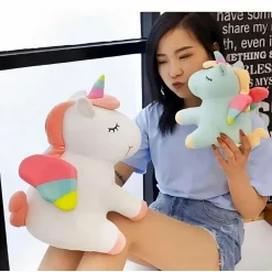 Peluche licorne bleue arc-en-ciel