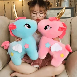 Peluche licorne bleue de corne dorée