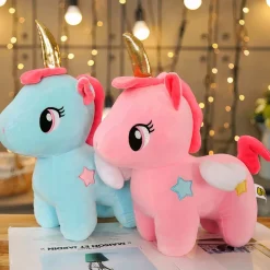 Peluche licorne rose de corne dorée
