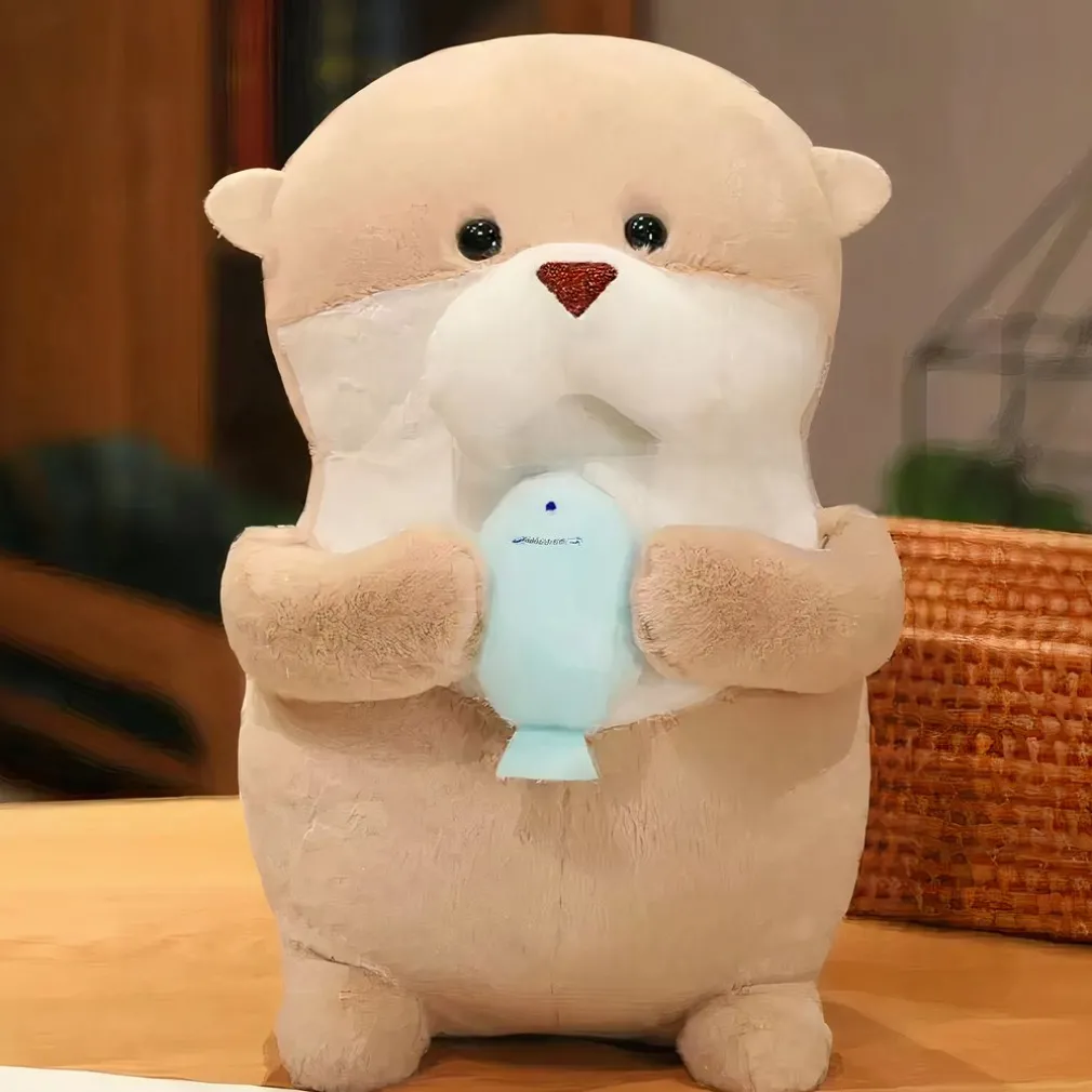 Peluche loutre avec son poisson