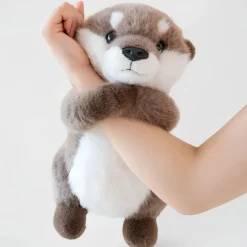 Peluche loutre debout