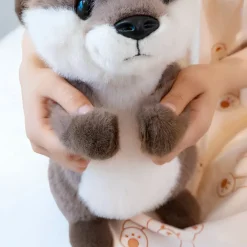 Peluche loutre debout