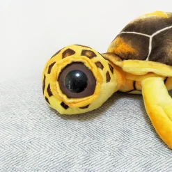 Peluche oreiller tortue à grands yeux