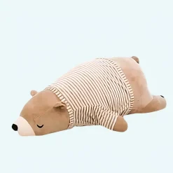 Peluche ours marron habillé qui dort