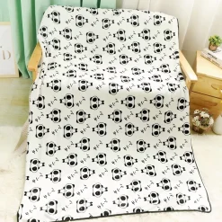 Peluche panda joyeux avec couverture