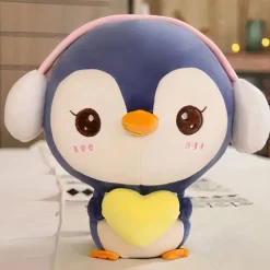 Peluche pingouin bleu avec cache oreilles