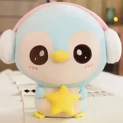 Peluche pingouin bleu clair avec cache oreilles