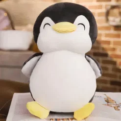 Peluche pingouin noir souriant