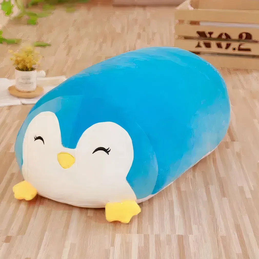 Peluche pingouin oreiller